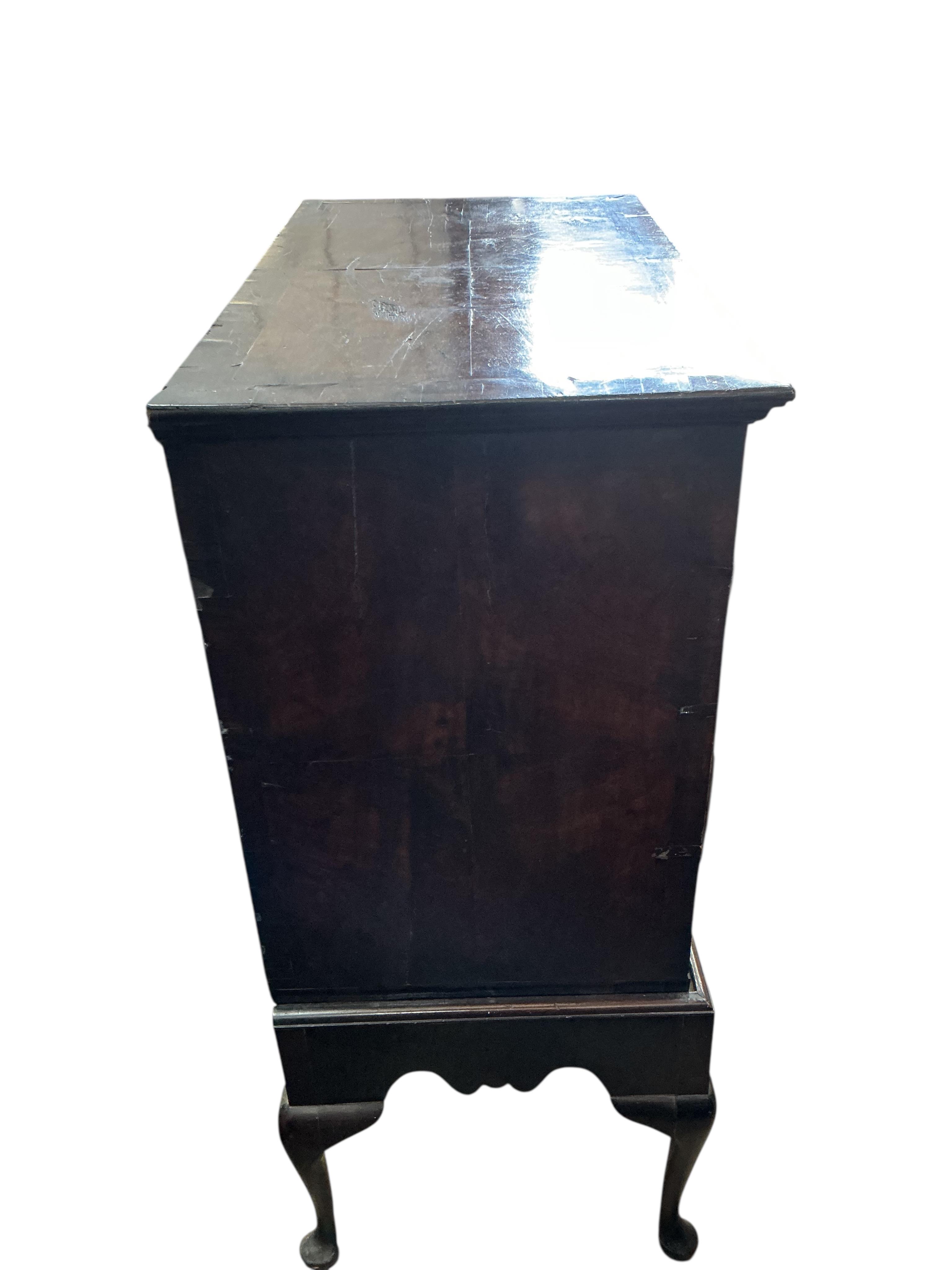 An 18th century banded walnut chest on stand, width 98cm, depth 54cm, height 131cm